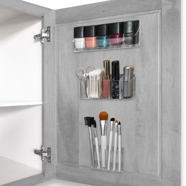 Medicine Cabinet Organization ideas in Small plastic bins on inside of medicine cabinet door.