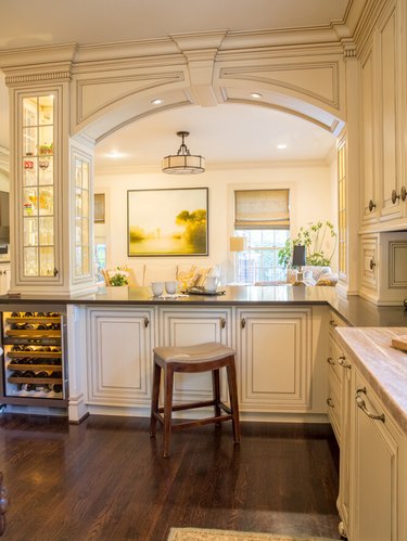 raised panel cabinetry and details in luxury white kitchen