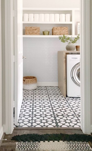 Budget-Friendly Small Laundry Room Ideas in black and white budget laundry room