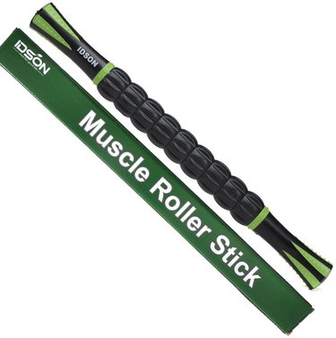 black and green muscle roller stick