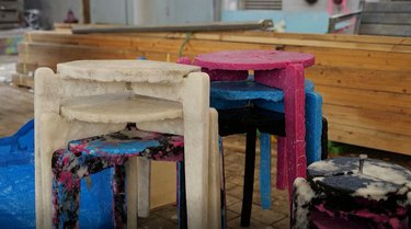 studio space with stacks of stools