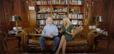 joe and jill biden on a brown leather couch in their home
