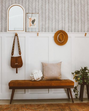 Hallway Makeover Ideas in boho hallway with coat hooks, bench and shelf