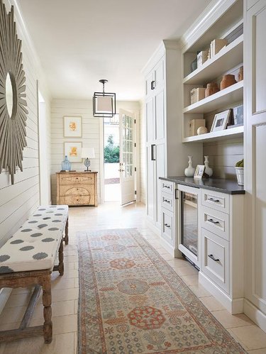 Taupe shiplap hallway designed by Kelley Vieregg Interior Design