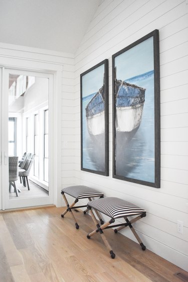 White shiplap hallway walls in hallway by Interior Impressions