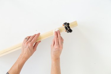 adding a clamp to a wood shelf DIY