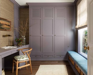 purple office with brown grasscloth wallcovering