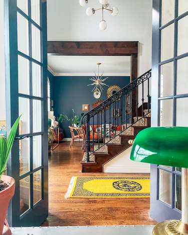 Sarisa Munoz The Indigo Leopard Home with French doors overlooking staircase