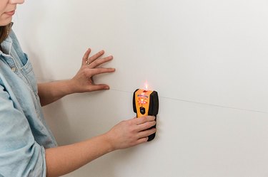 Find the studs using a stud finder.