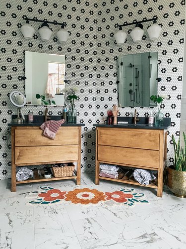 Sarisa Munoz The Indigo Leopard Home bathroom with black and white mosaic tile walls