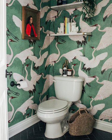 Sarisa Munoz The Indigo Leopard Home bathroom with bird pattern wallpaper