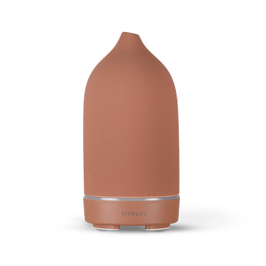essential oil diffuser in earthy red color