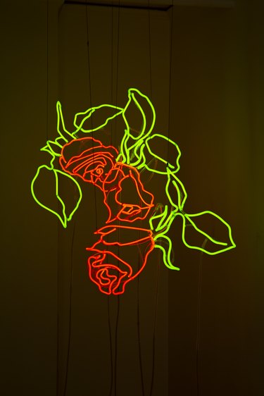 Leticia Maldonado neon artwork of roses with stems
