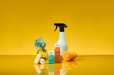 solid cleaning supplies with yellow background