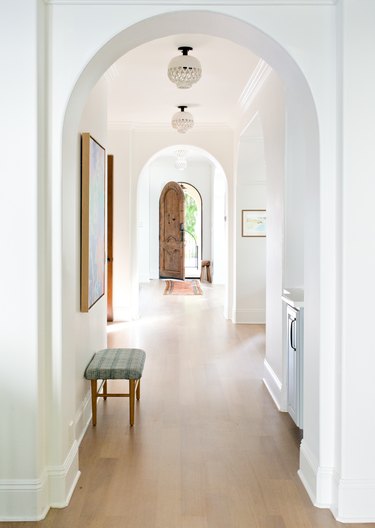 Contemporary Foyer Lighting in entryway designed by Kate Lester Interiors