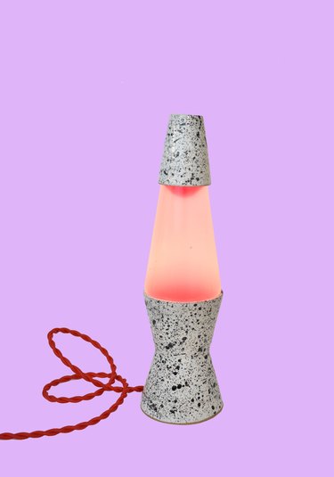 pink lava lamp with red cord