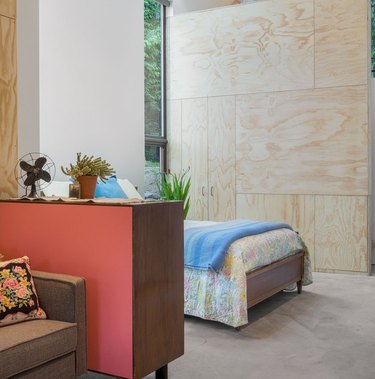 plywood walls in converted garage bedroom idea