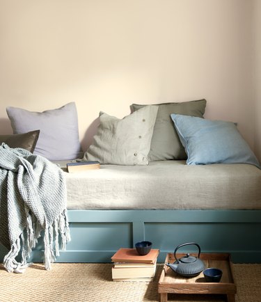 bench with pillows and teal bottom