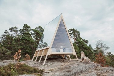 eco-friendly home design for A-frame cabin with aluminum roof