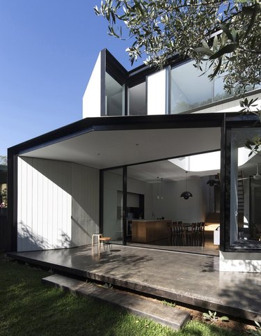 eco-friendly home design with white and black home exterior