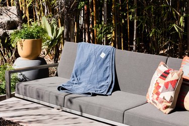 Blanket on outdoor patio couch