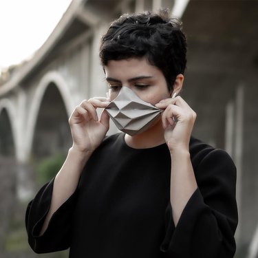 person wearing origami-style mask