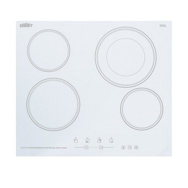 white ceramic stovetop with four burners from Summit Appliance