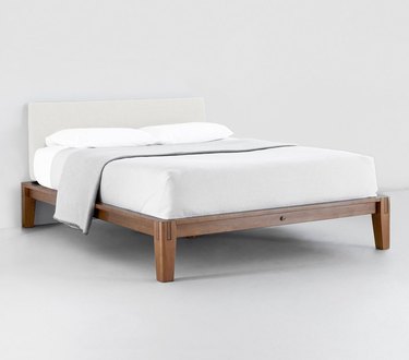 eco-friendly bed frame with upholstered headboard