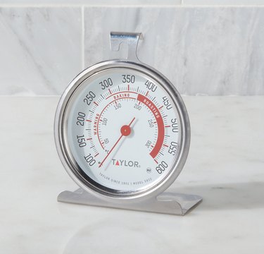 Oven thermometer on marble counter. small stove size ideas