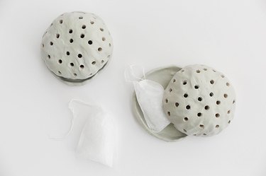 Paint the dry clay diffusers and put a scented beads bag inside.