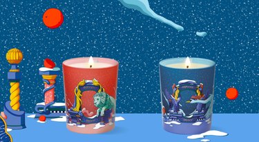 two candles, one red and one blue, with animated background
