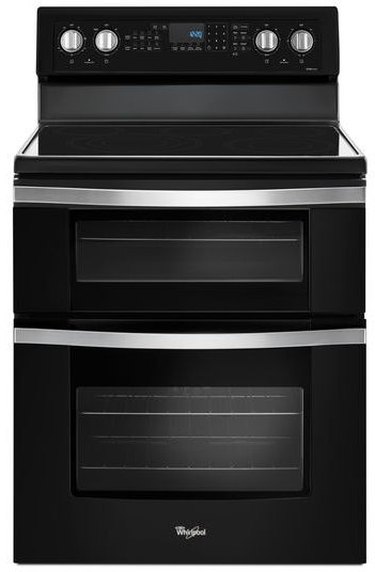 black stainless steel flat top electric stove with two ovens