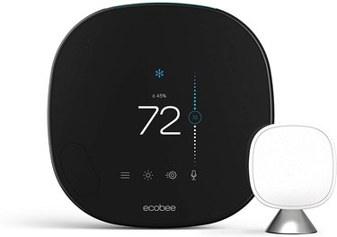 Rounded square black touchscreen thermostat