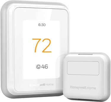 White rounded rectangular thermostat