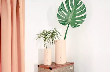 Leather vase using rivets