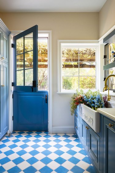 blue and white French-inspired mudroom storage