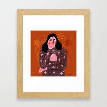 figure with black hair on red background, framed