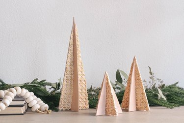 Christmas trees made with cane and leather for holiday decor