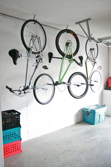 bike storage hanging from a garage ceiling