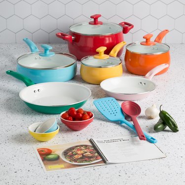 Ceramic cookware set with each item in a different bright color