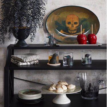 shelf with skull platter