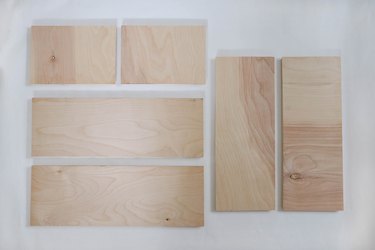 Six wood boards cut to size for dollhouse