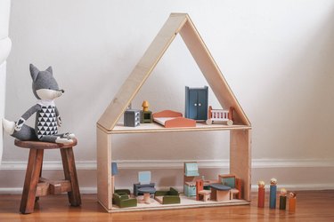 DIY wooden dollhouse with wooden dolls and colorful furniture