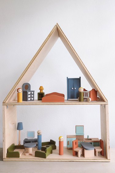 DIY wooden Scandi-style dollhouse with wood dolls and furniture