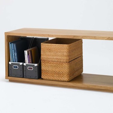 oak bench with magazine holders and baskets
