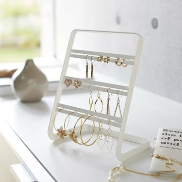 white earring jewelry organizer with three tiers