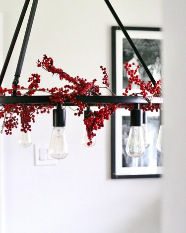 lighting fixture with holly berries.