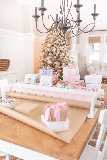 diy wrapping paper storage on wooden table