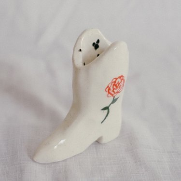 small contemporary ceramics cowboy boot with rose illustration