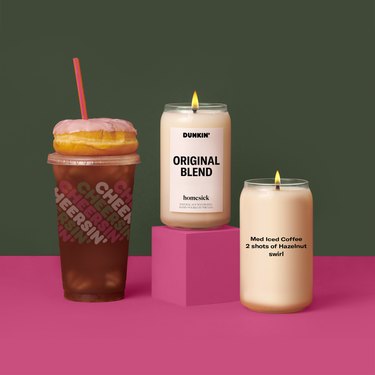 the homesick and dunkin' original blend candle, a customized candle, and a dunkin' coffee and donut